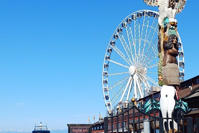 Seattle Waterfront Electric Scooter Tour with Great Wheel - Pier 59 to Bell Harbor: aquarium area, elevated Market views, and tall ships