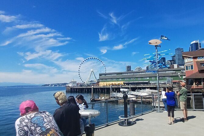 Seattle Waterfront Electric Scooter Tour with Great Wheel - Ferries at Colman Dock, Kitsap crossings, and why the working docks matter